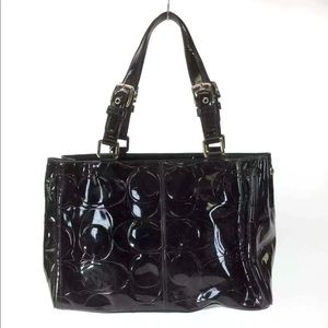 Coach Monogrammed Embossed Black patent leather